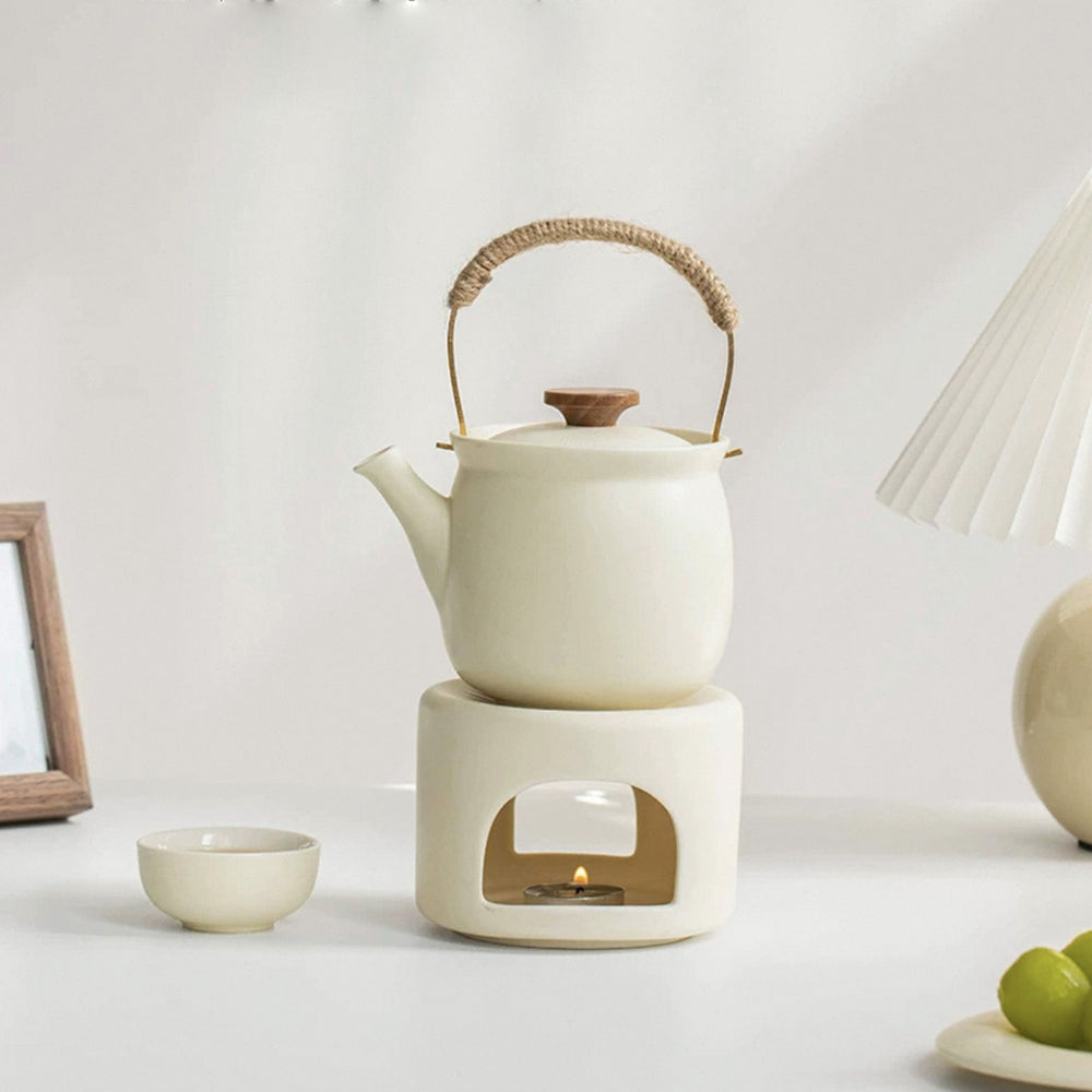 cream teapot with candle warmer for dining