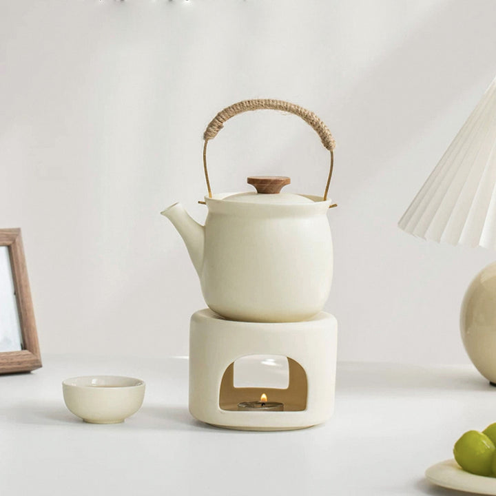 cream teapot with candle warmer for dining