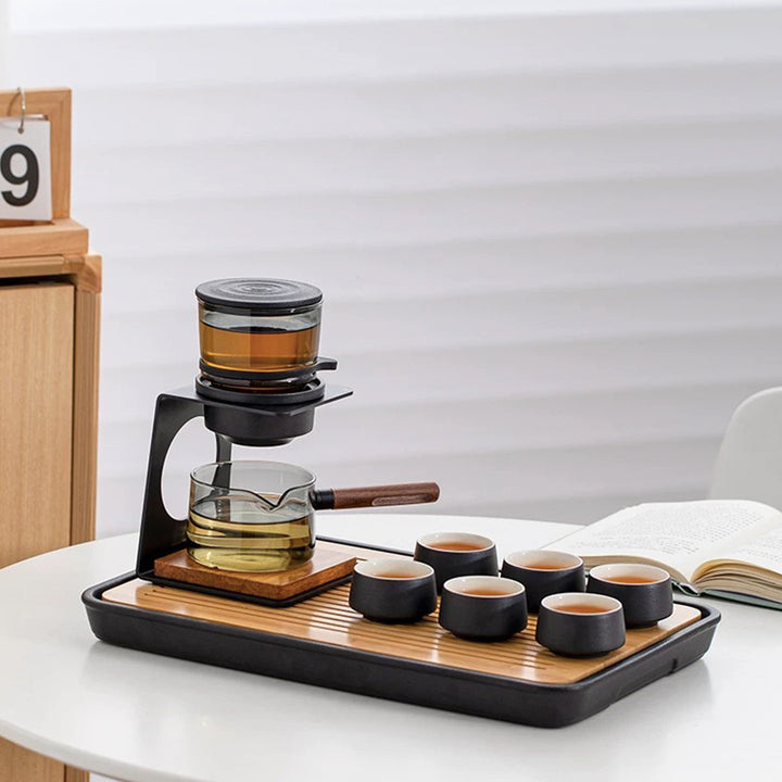 automatic tea set with teapot, cups and tray