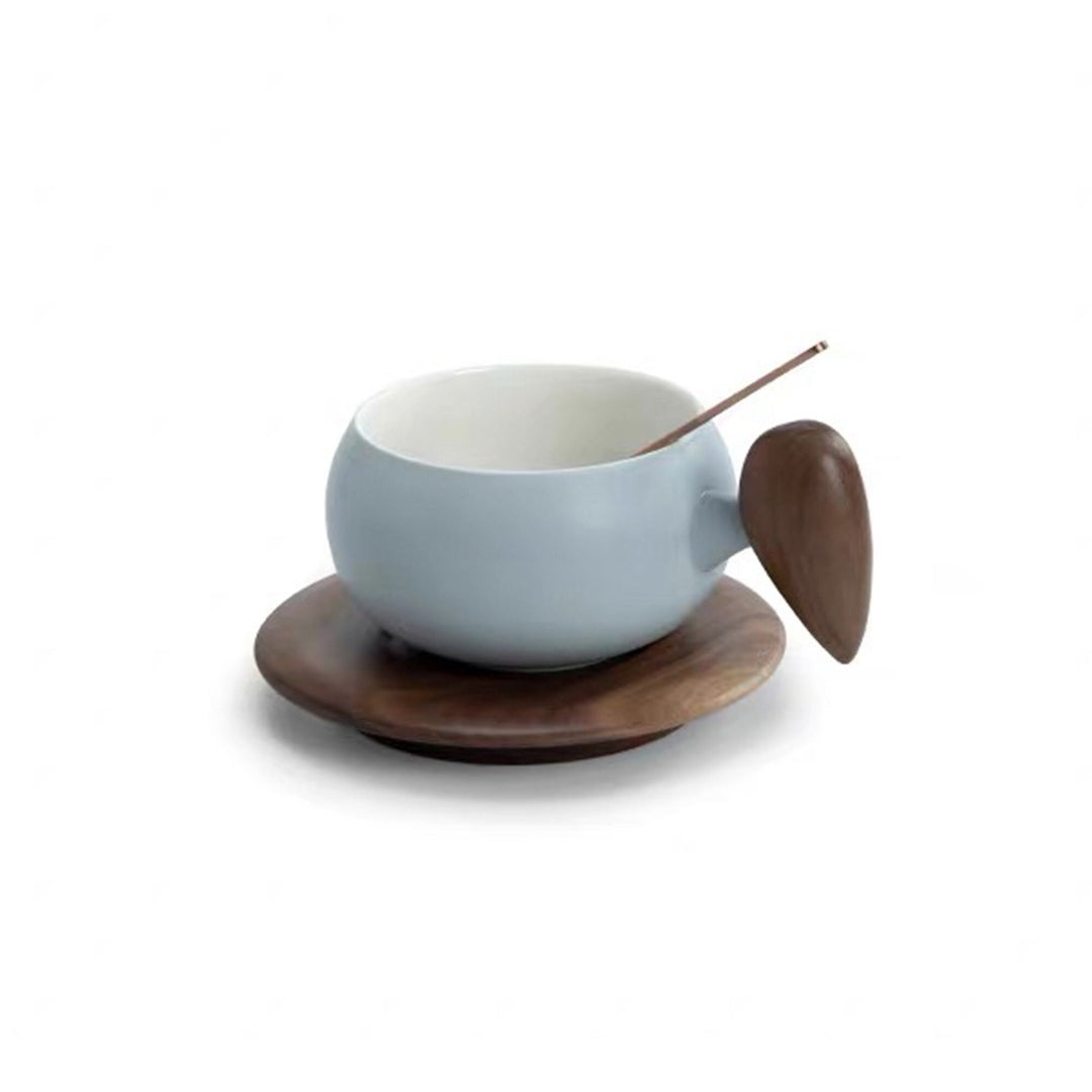 Blue boho coffee mug with wood handle and saucer