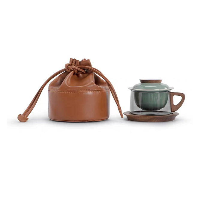 Green glass tea coffee with infuser and coaster