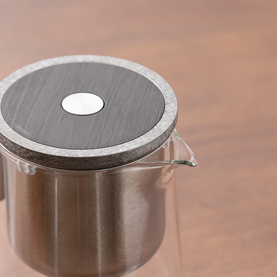 Flowing | Titanium and glass one-touch-teapot