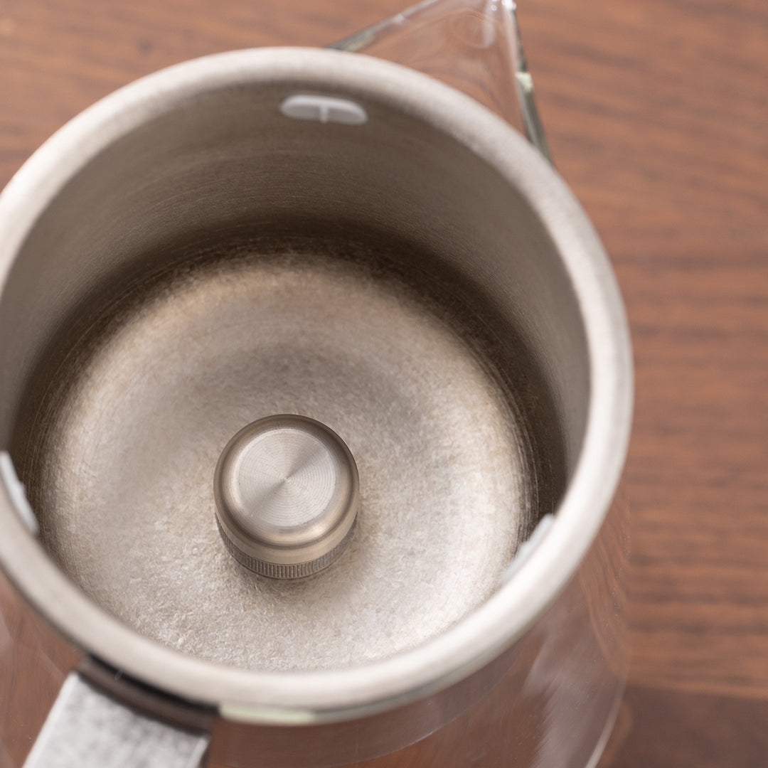 Flowing | Titanium and glass one-touch-teapot