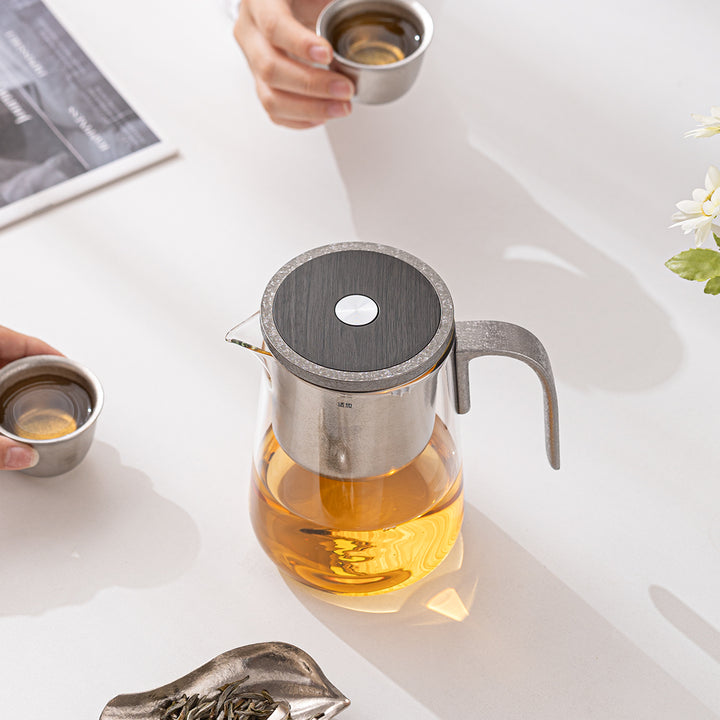 Flowing | Titanium and glass one-touch-teapot