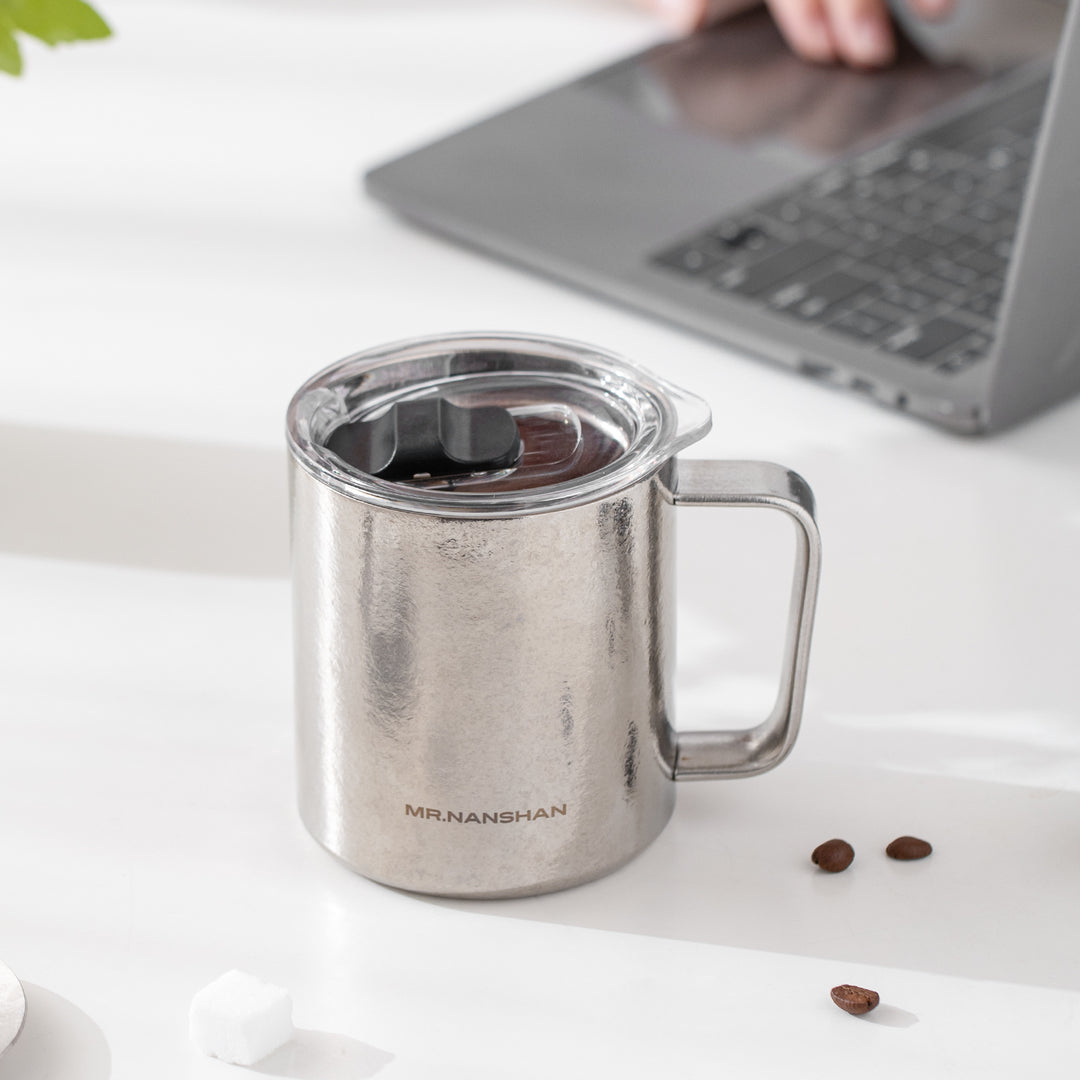 Enjoy - Pure Titanium mug with lid for coffee and tea