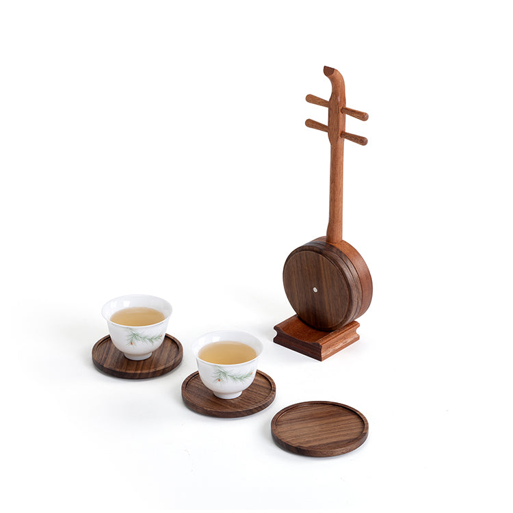 Wooden pipa stand with two teacups on coasters