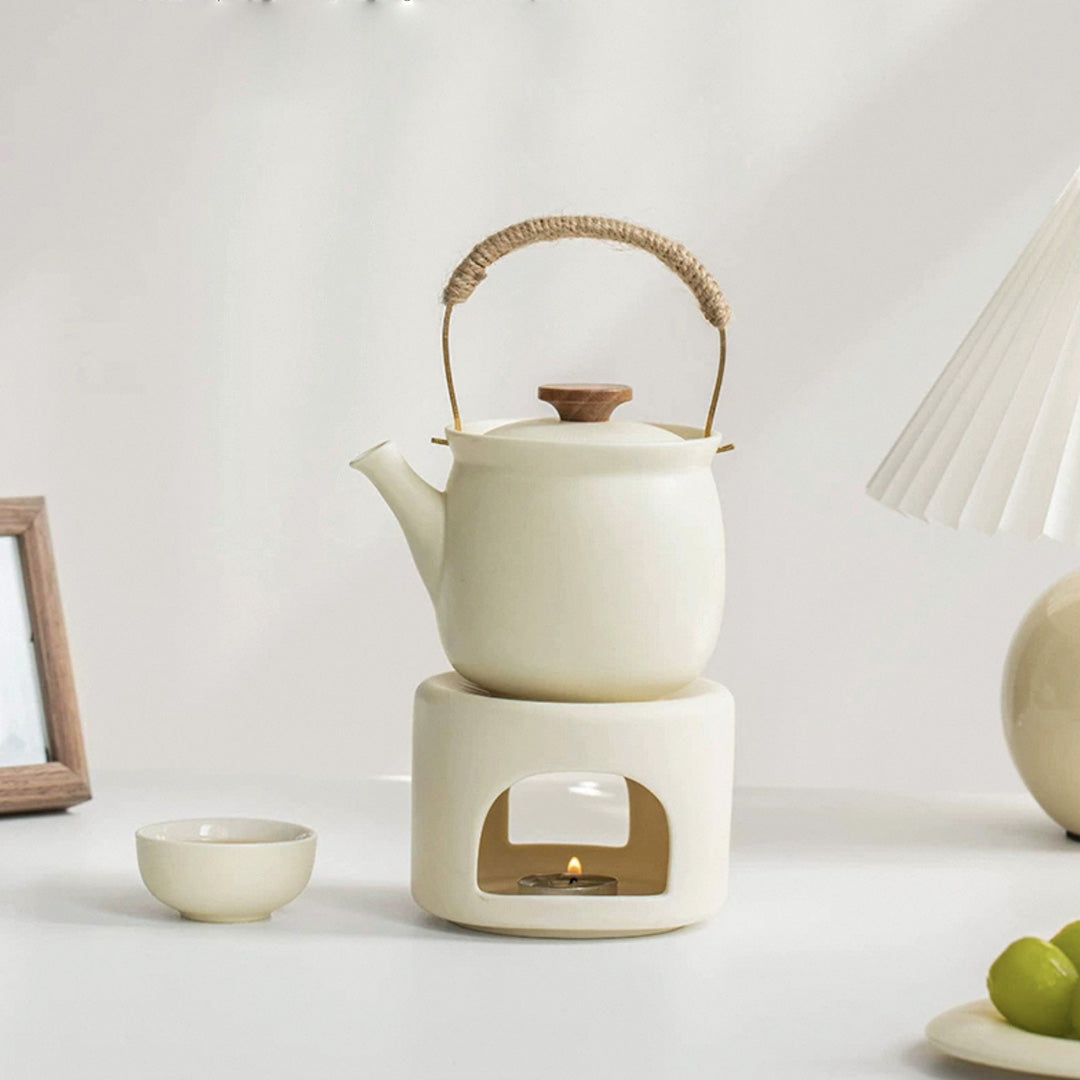 cream teapot with candle warmer for dining 