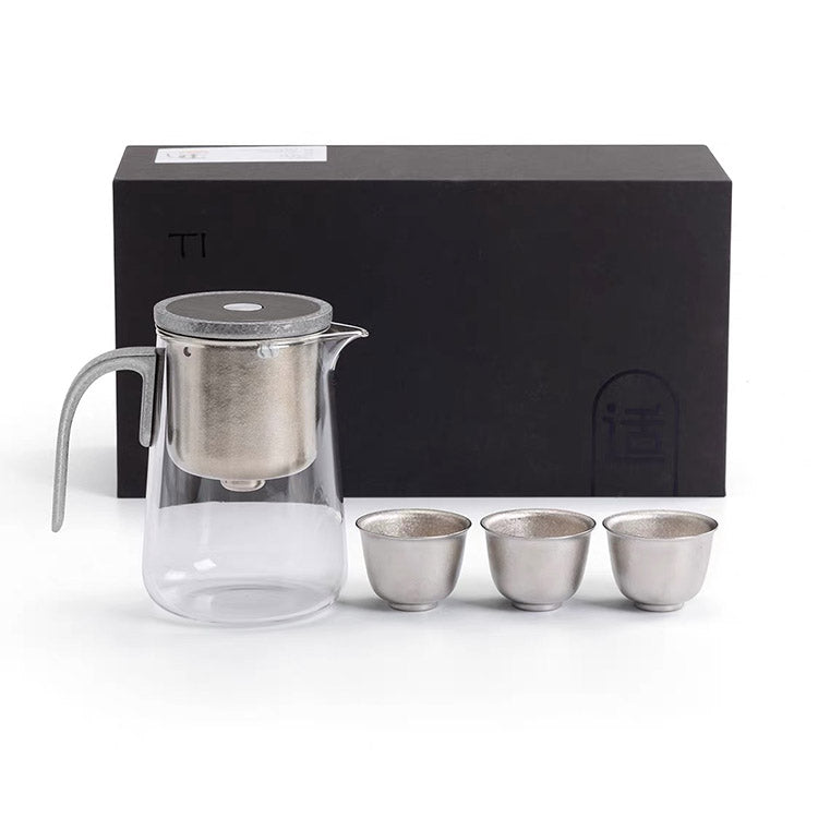 Flowing | Titanium and glass one-touch-teapot