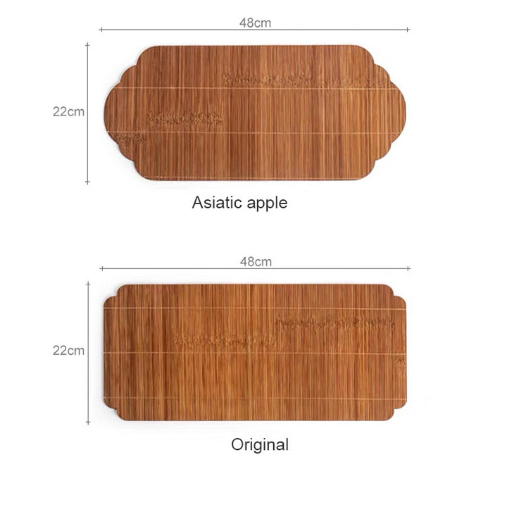 Two rectangular bamboo serving boards with rounded decorative ends are shown on a white background, labeled 'Asiatic apple' and 'Original,' each with dimension markers indicating 48 cm by 22 cm.