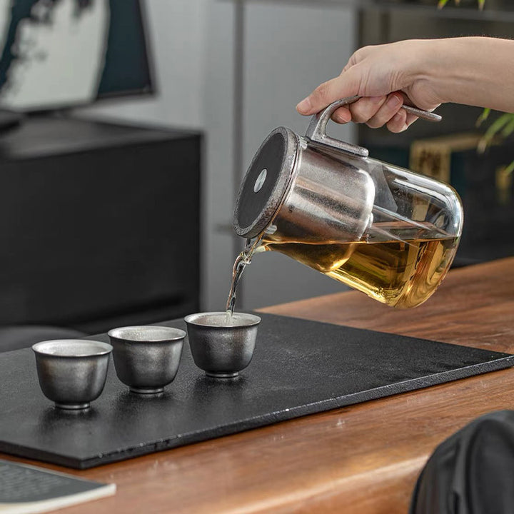 Flowing | Titanium and glass one-touch-teapot