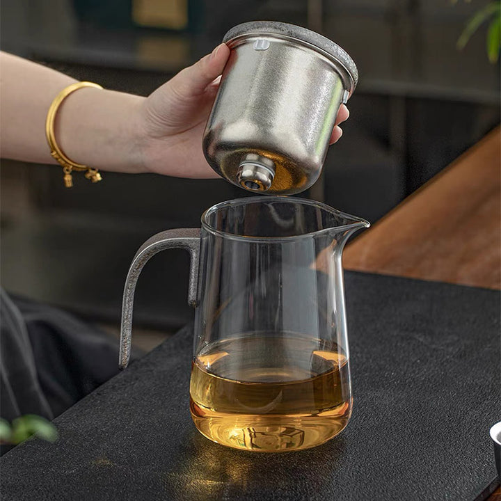 Flowing | Titanium and glass one-touch-teapot
