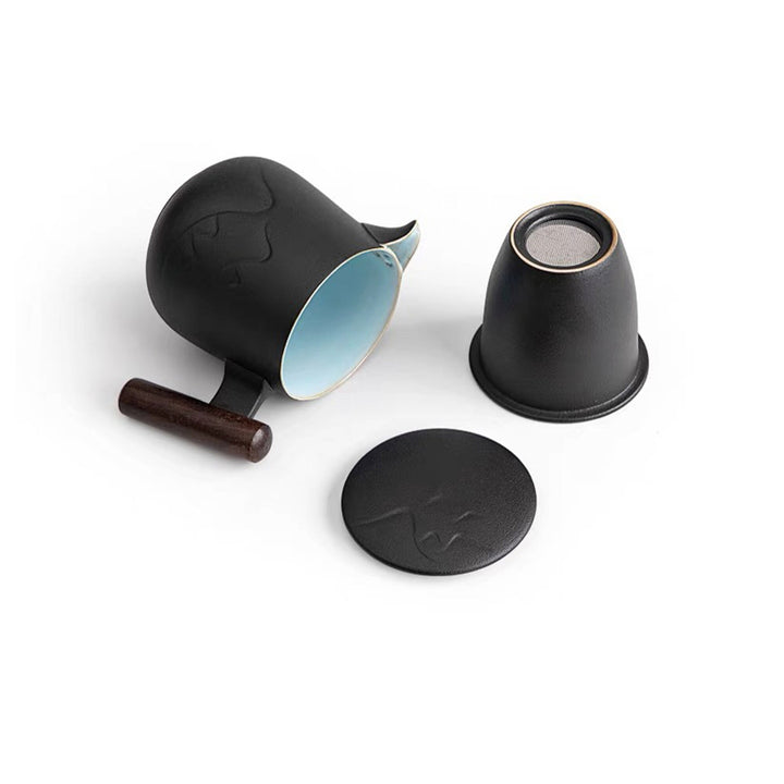 teapot with infuser, handle, and lid